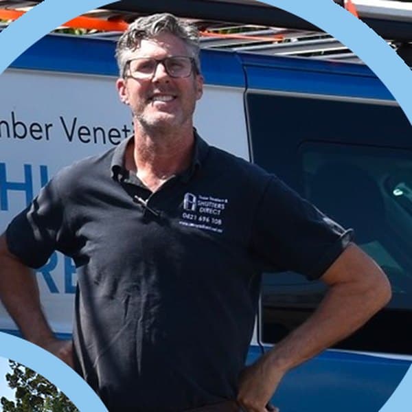 Andrew from Shutters Direct standing in front of one of the company vans